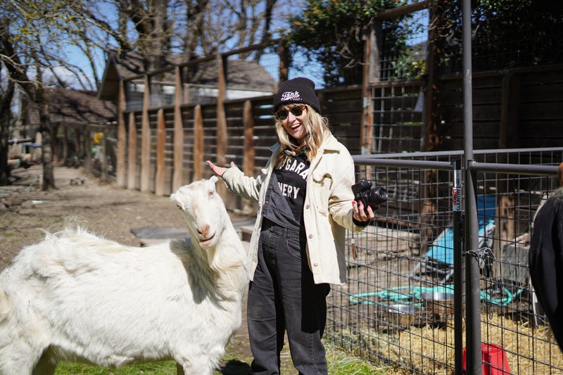 a girl and a goat