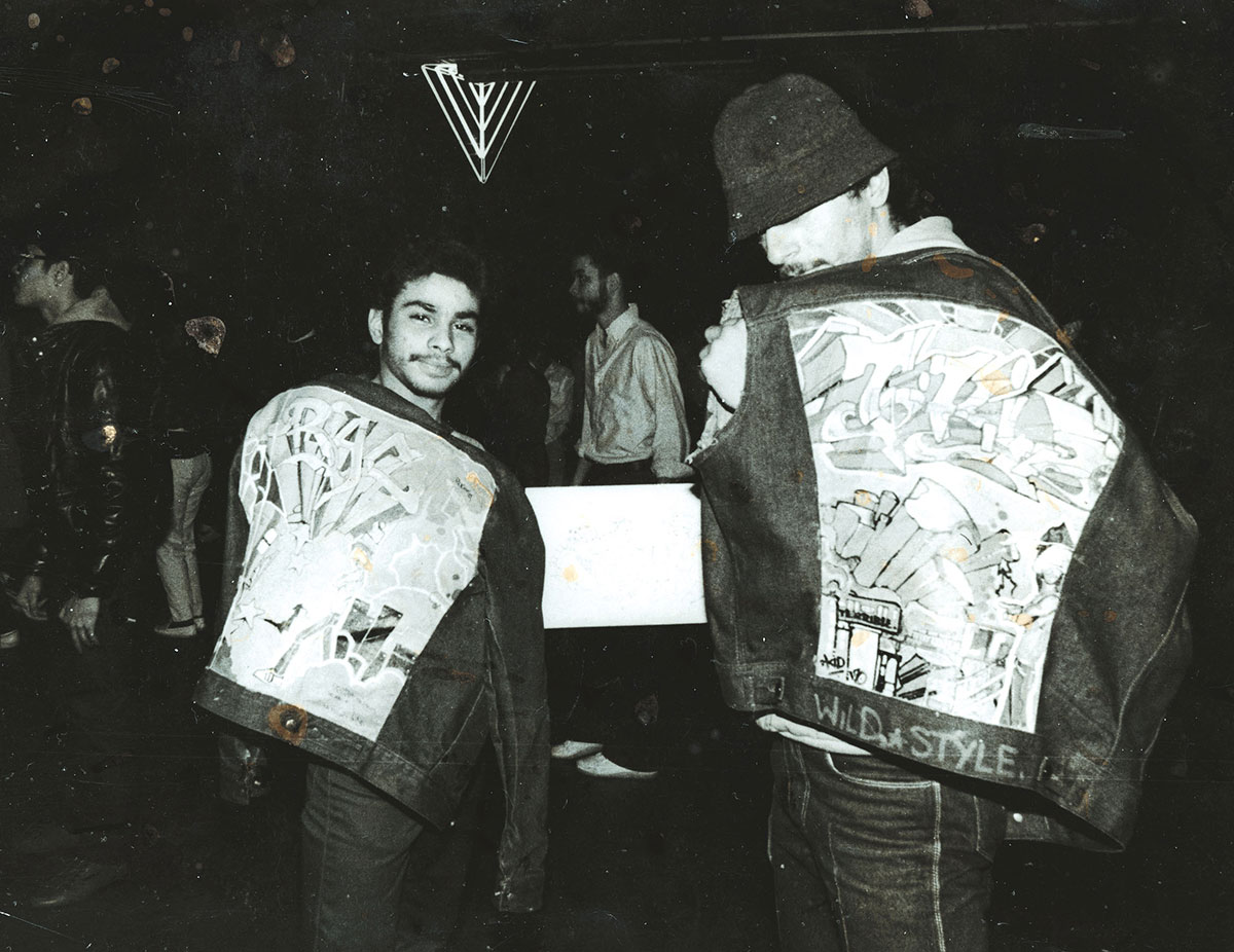 Two b-boys with graffiti jackets