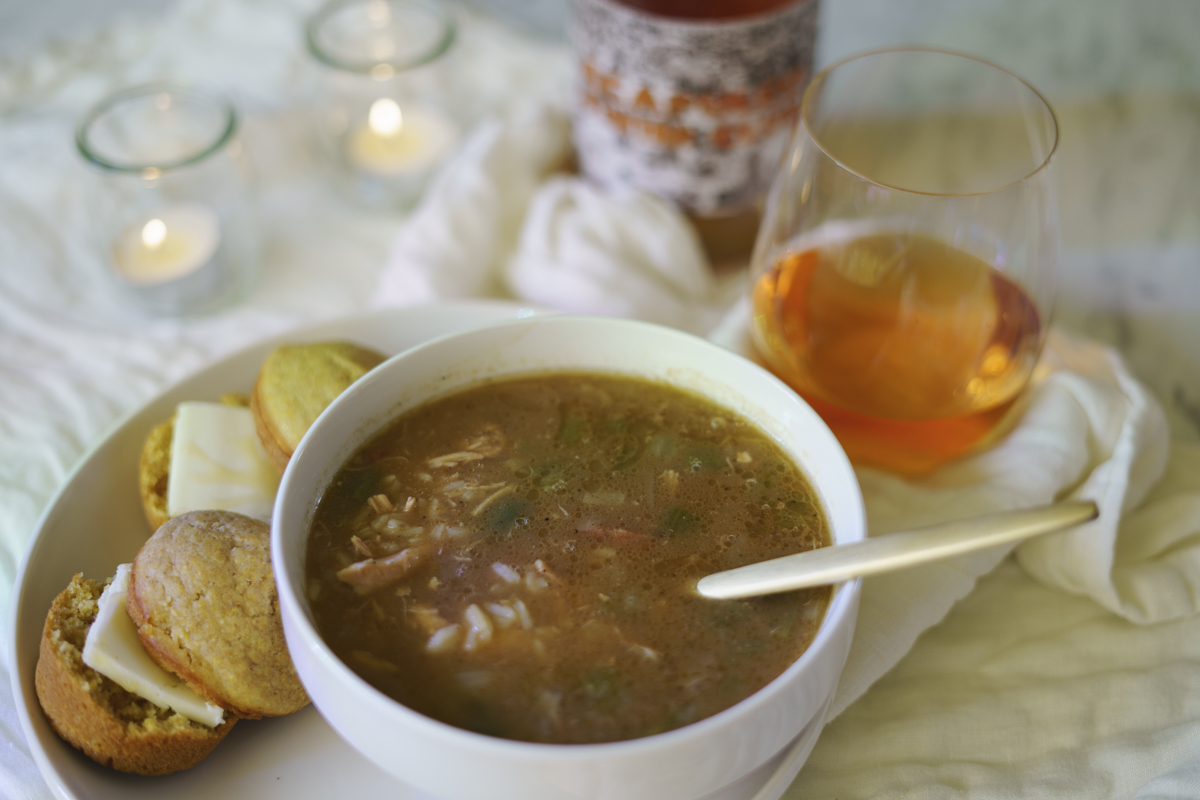 A bowl of Gumbo and a glass of Acapulco Swim Club