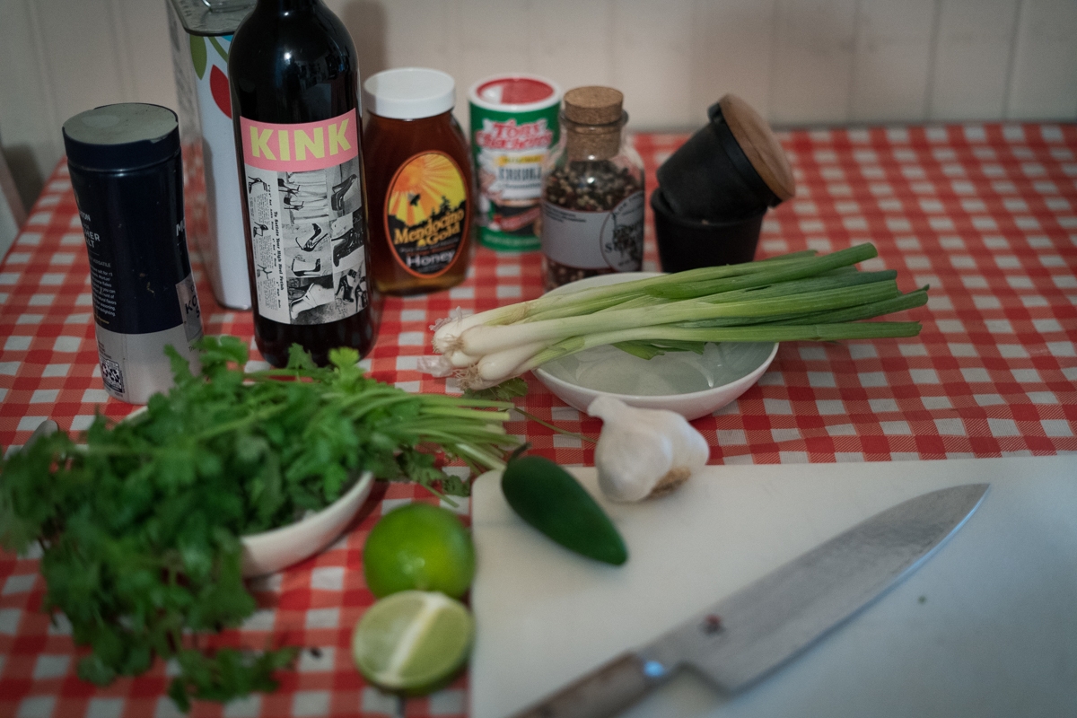 Ingredients for marinade displayed on a cutting board.