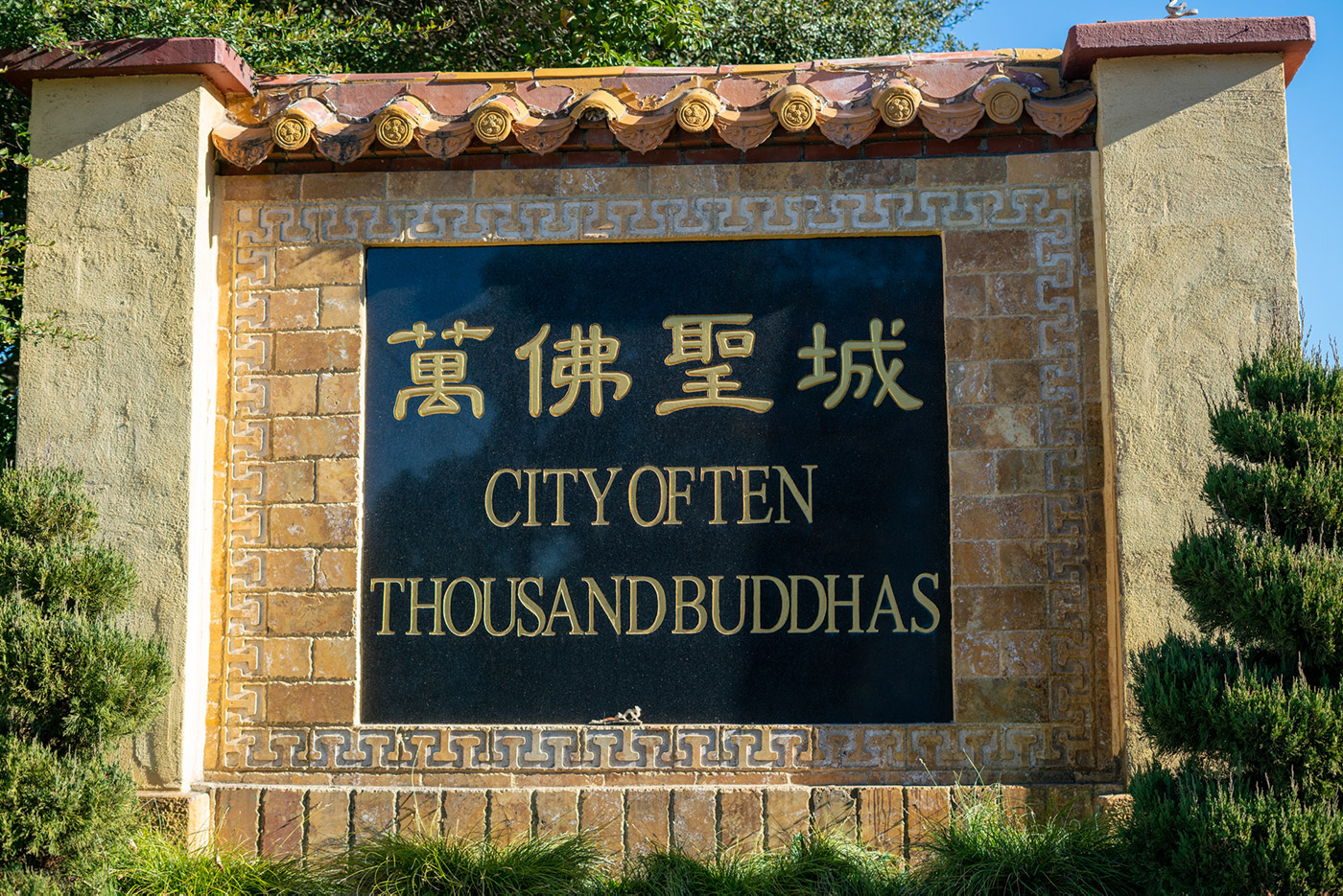 city of ten thousand buddhas sign