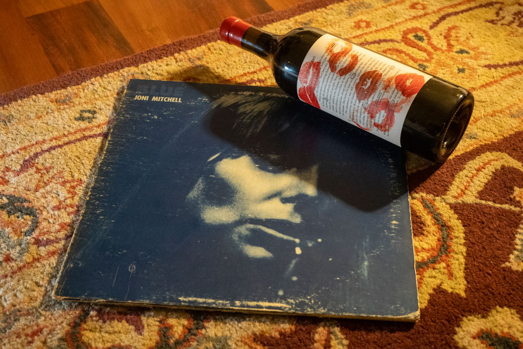 Joni Mitchell's Blue and a bottle of red wine