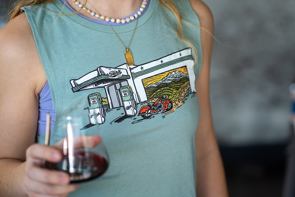  Baelei sporting our new Wild Tribute Tank in Stone Green, featuring our tasting room.