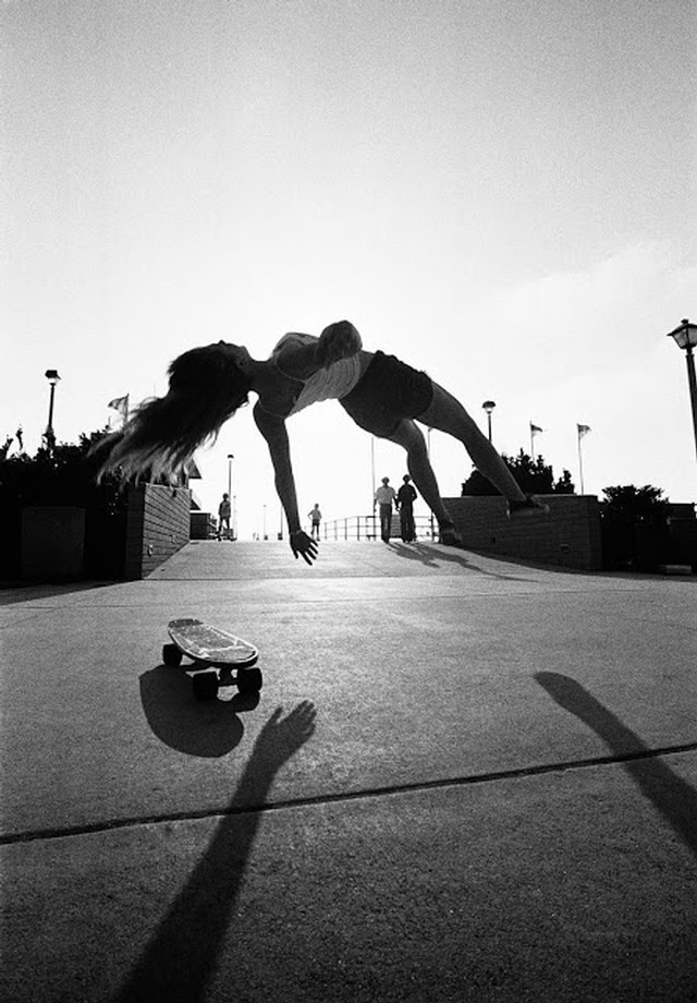 girl falling off skateboard