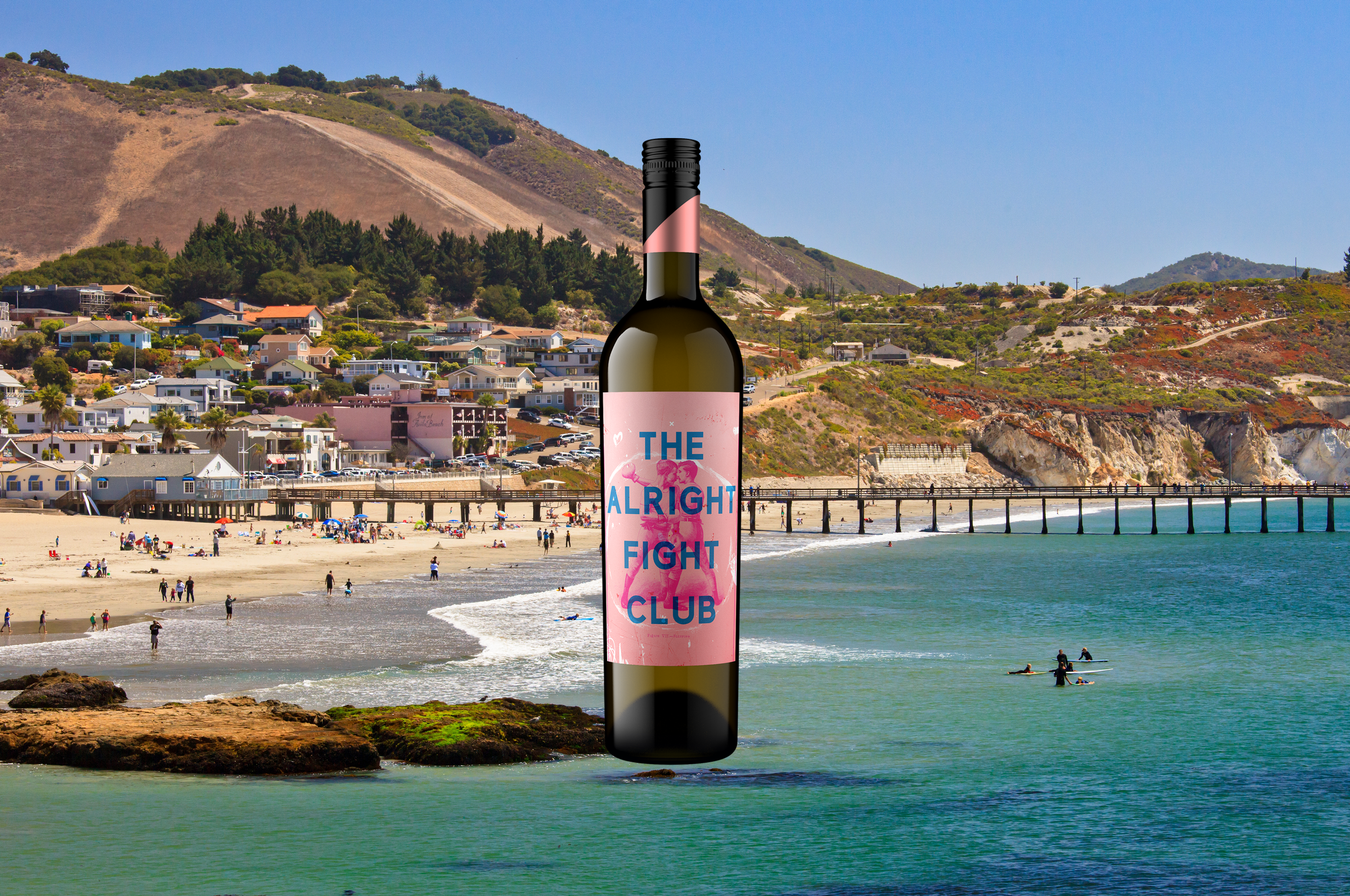 Bottle of The Alright Fight Club in front of San Luis Obispo seaside